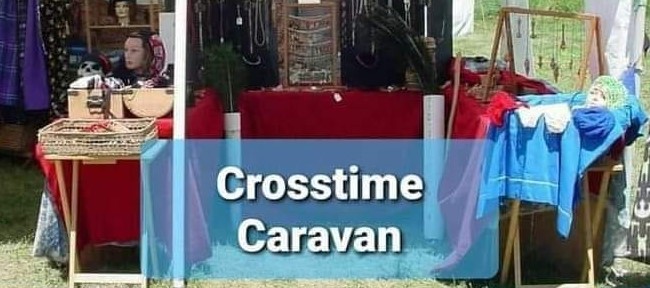 Crosstime Caravan vendor booth with colorful displays